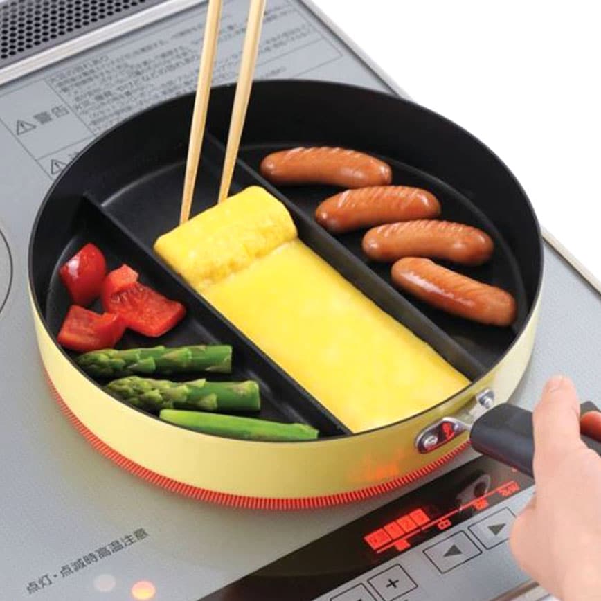 https://shutupandtakemyyen.com/wp-content/uploads/2018/10/Divided-Tamagoyaki-Omelette-Frying-Pan.jpg