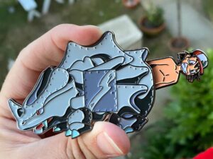 Pokemon Ash Ventura Rhyhorn Birth Slider Pin